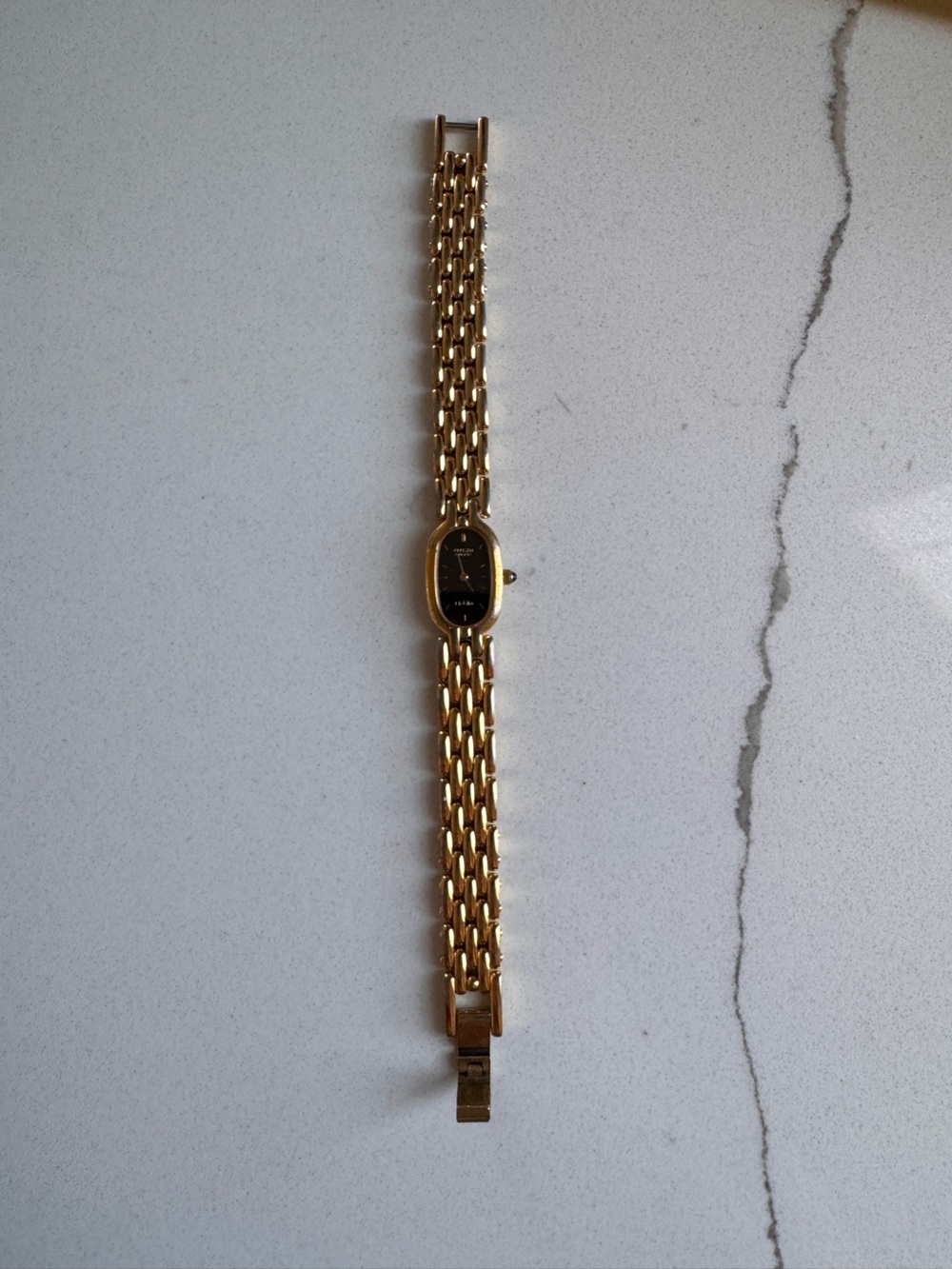 Citizen’s Women’s Gold and Back Wristwatch